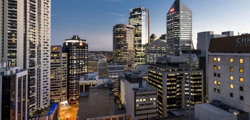 spectacular view of Brisbane city skyline at night from Oaks Lexicon Apartments hotel balcony